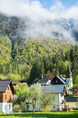houses with mountains alps peaks background