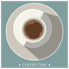 Top view of coffee cup on a saucer with COFFEE TIME inscription