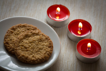 View of the Homemade cookies surrounded by candles, hygge time