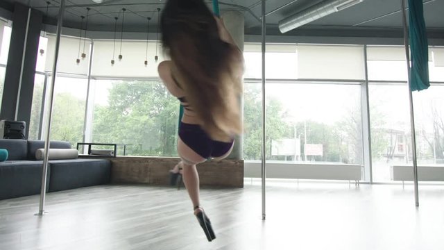 Young Girl Training Pole Dance 4K