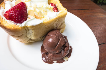Honey toast strawberry on white plate