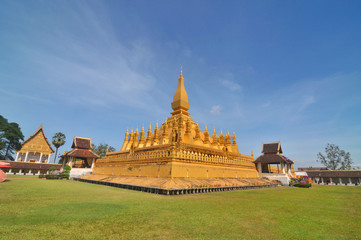 Buddhist  temple  Pha That Luang with Lying Buddha  in Vientiane in Laos.   © robnaw
