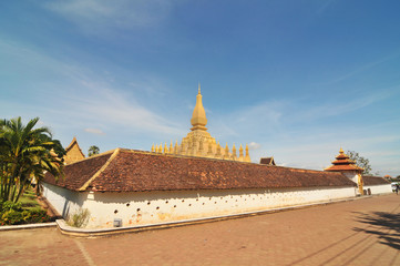 Buddhist  temple  Pha That Luang with Lying Buddha  in Vientiane in Laos.   © robnaw