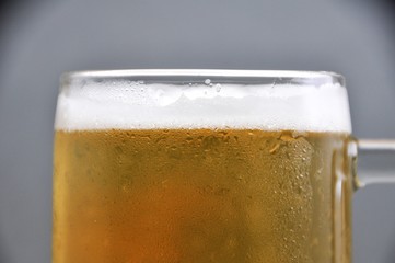 Mug of beer on white background