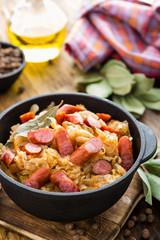 Cabbage braised with sausages, sauerkraut. German cuisine.