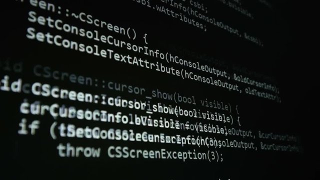 Source code on computer screen. Cybersecurity concept.