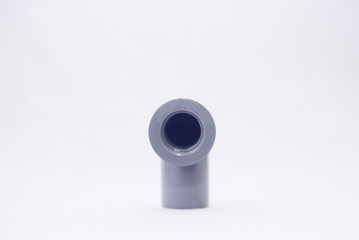Pipe and fitting over white backgrounds