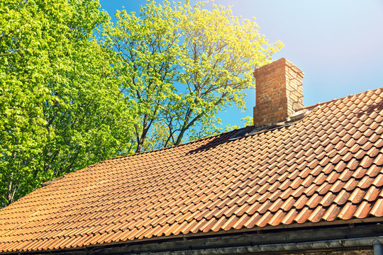 roof tile against blue sky on sunny day