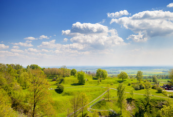 Fototapeta premium Landscape with green grass hills and trees Annaberg Upper Silesia Poland