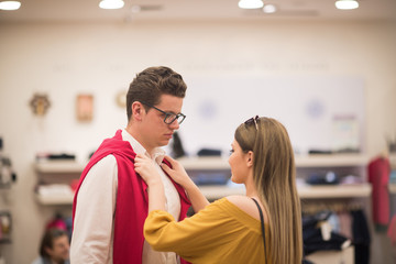 Naklejka premium couple in Clothing Store