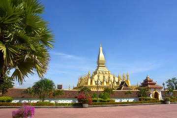 Buddhist  temple  Pha That Luang with Lying Buddha  in Vientiane in Laos.   © robnaw