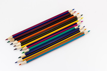 Multicolored pencils isolated on white background