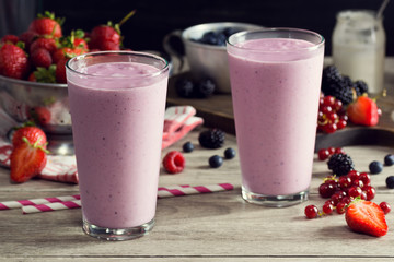 Two Mixed Berry Smoothies or Shakes With Ingredients