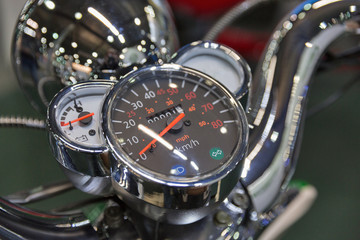 Dashboard with speedometer of electric motorcycle closeup