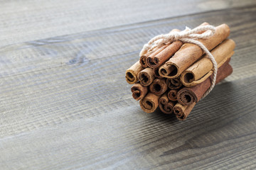 fresh cinnamon on wooden table