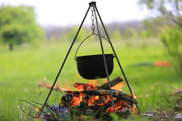 tourist kettle over fire