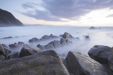 Serene seascape in Barrika beach, Biscay, Basque Country, Spain. Long exposure shot.