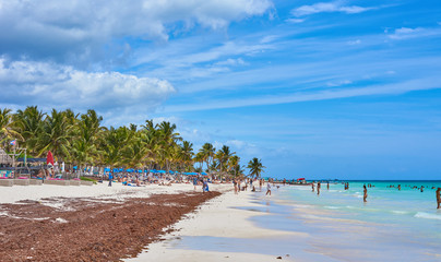 Caribbean coast of Riviera Maya / Tourists at so called 