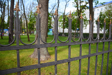 Metal fence close up. Metal Forged Fence. Beautiful wrought fence. Metal fence close up. 