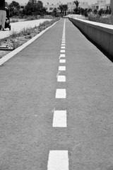 Obraz premium bicycle road, black and white 