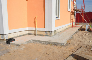Insulation with waterproof membrane,insulation, stucco for house foundation construction. House...