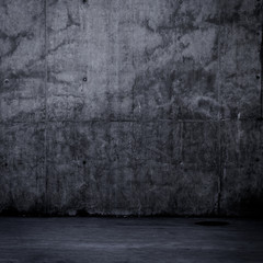 Simple dark concrete wall background with texture