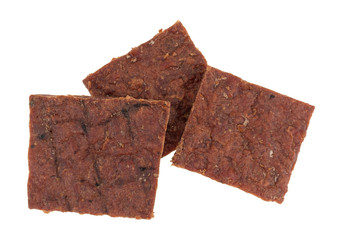 Peppered beef jerky isolated on a white background.