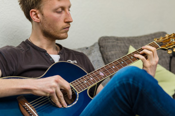 Student Plays Guitar
