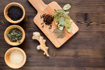 Cooking with spices, salt and pepper on kitchen table background top view