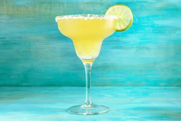 Möbelaufkleber Lemon Margarita cocktails on vibrant turquoise with copyspace © laplateresca