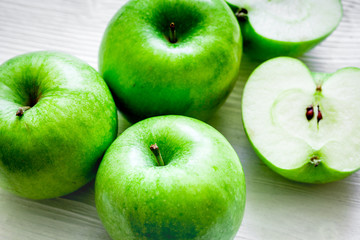 summer food with green apples on white background