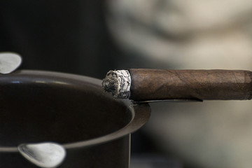 cigar and ashtray