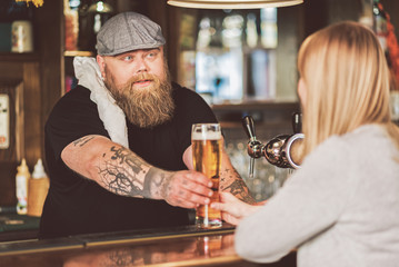 Bearded male working in pub
