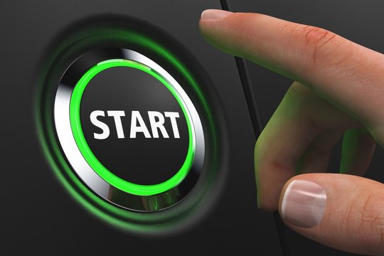 Button Start mit gr&uuml;ner Beleuchtung - Hand