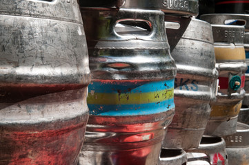 Beer kegs used to store drinks stacked up © tommoh29