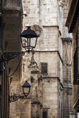 Fototapeta na wymiar Narrow street in gothic quarter of Barcelona