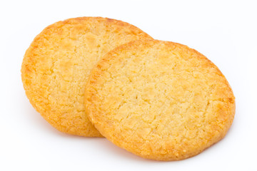 Stacked short pastry cookies isolated on white background.