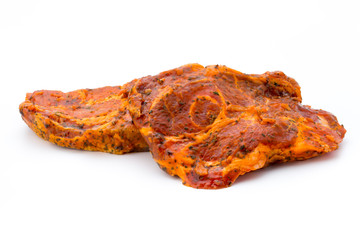 Pork chop, marinated. Isolated on the white background.