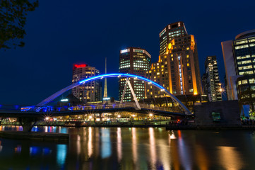Melbourne river view with pedestrian bridge at night