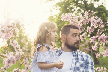 Fototapeta premium father and baby on arms