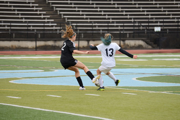 Naklejka premium Girl getting kicked on the leg