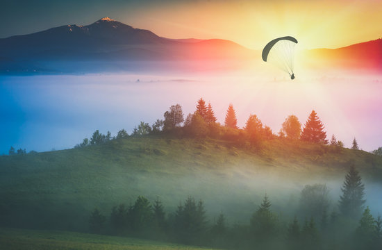 Flying above foggy valley. Instagram stylisation