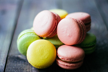 Homemade tasty macaroni cookies on a wooden base .