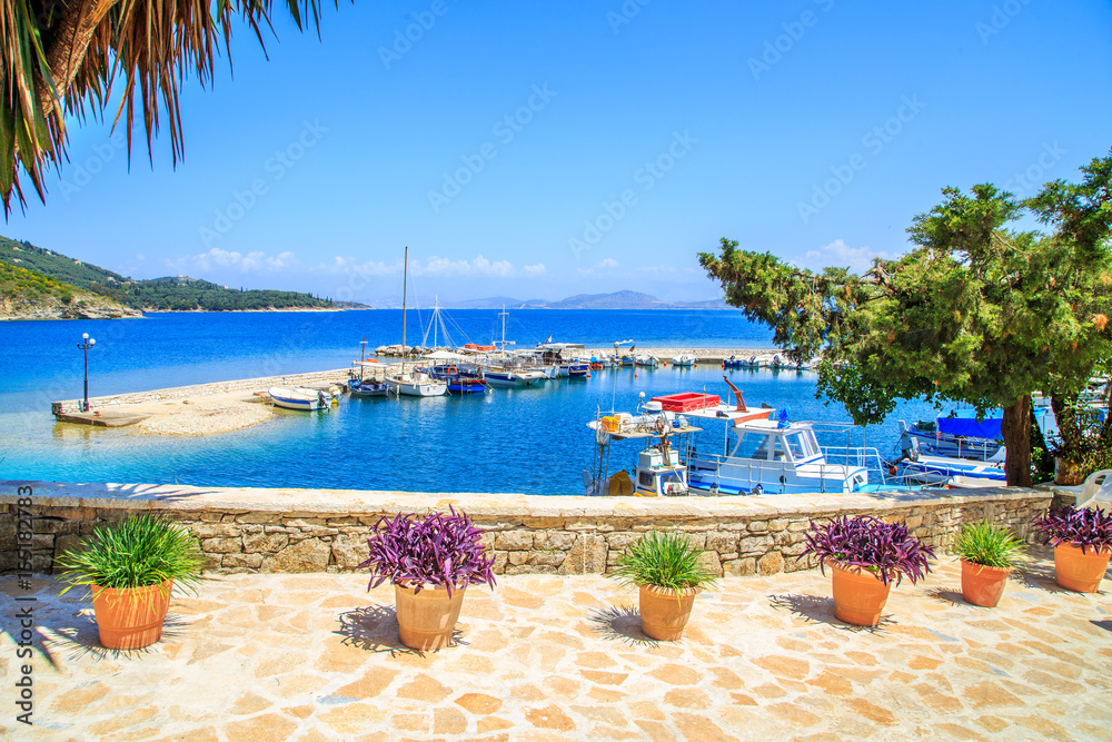 Wall mural boats in port kouloura in corfu, greece