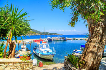 Boats in port Kouloura in Corfu, Greece - Powered by Adobe