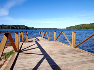 Wooden pier on the shore of the lake