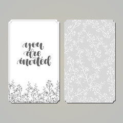 Hand written calligraphic lettering for wedding. Wedding Invitation set with floral in sketch style hand drawn grey flower modern design.