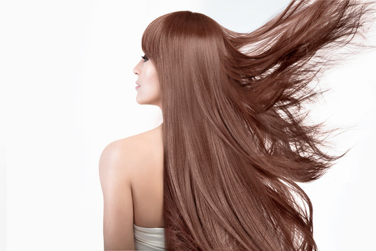 Beauty model with a gorgeous long hair. Flying hair