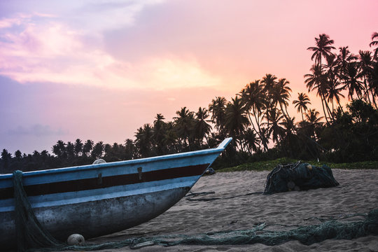 Fishing boats on kahandamodara just outside Tangalle, Sri Lanka, at sunset.