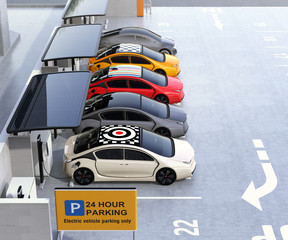 Parking lot equip with solar panel, battery and charging station for electric cars only. . 3D rendering image.